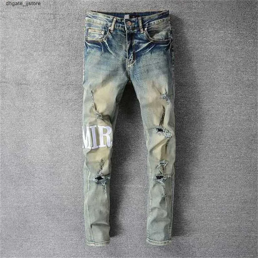 Diseñador de jeans masculinos Pantalones Punk Risped Pantalon Homme para hombres Retro Old Street Fashion Letter Motorcy048m