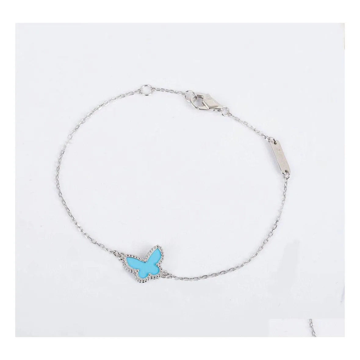 Charm Bracelets S925 Sier Pendant Bracelet With Blue Butterfly Shape In Two Colors Plated And Rhombus Clasp For Women Wedding Jewelr Dh4Zu