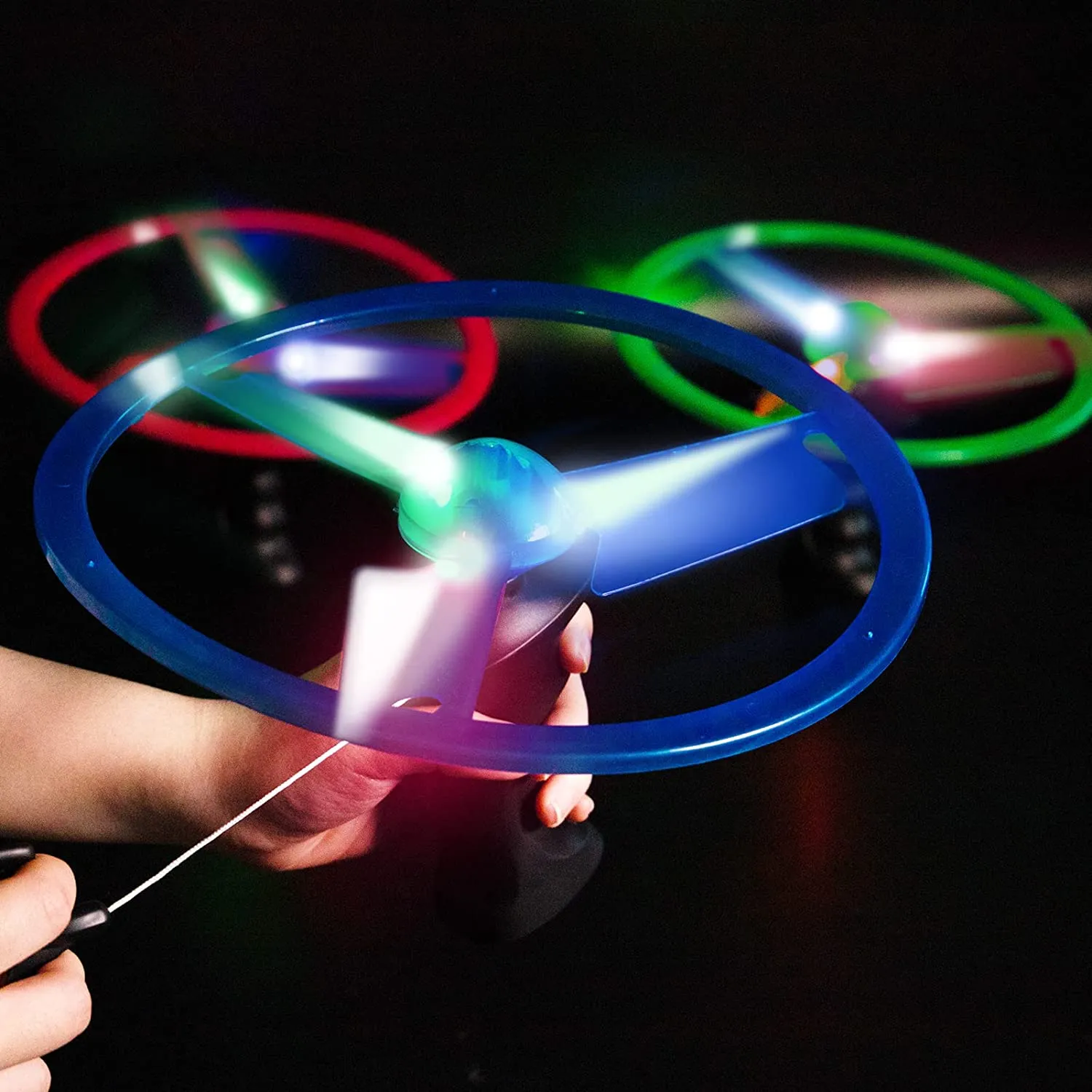 LED Flash Flying Flying Ufo Toys Handheld Pulling Line Light Light Children Disk Shooter Fly Saucer Frisbee Toy مع مصباح الشعر