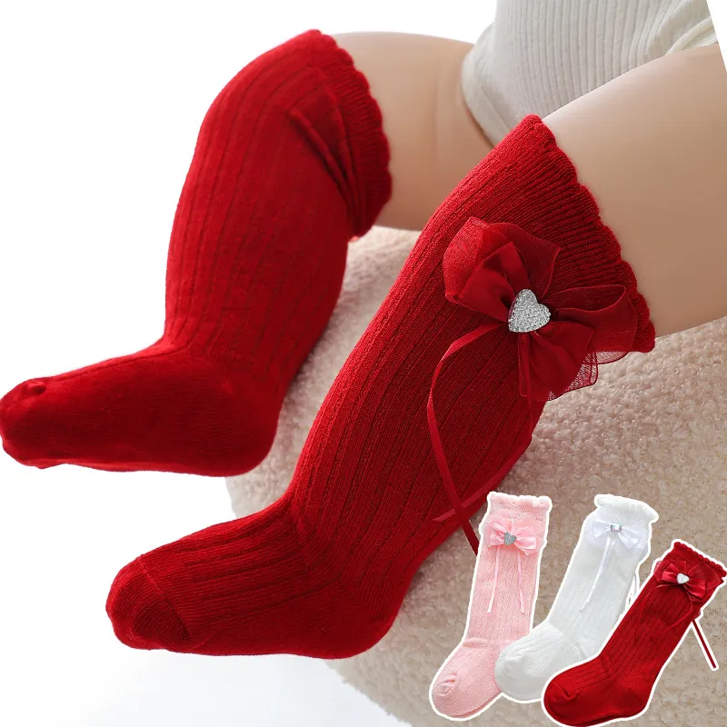 Chaussettes hautes à nœud de couleur unie pour bébés filles, chaussettes de princesse mignonnes à nœud papillon pour nouveau-né, chaussettes longues pour nourrissons en bas âge, printemps et automne