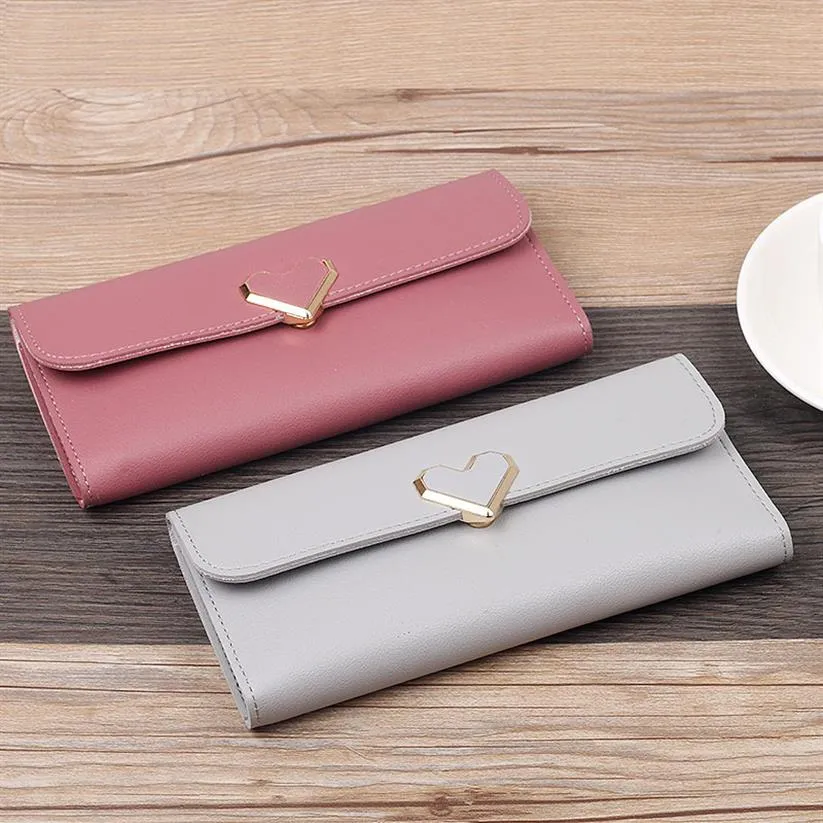I produttori che vendono il nuovo portafoglio lungo da donna in metallo al trenta per cento amano la versione giapponese e coreana della borsa a mano più scr3126
