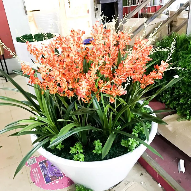 Flores decorativas Grandes plantas artificiales de Cymbidium PU Sansevieria Hojas de orquídeas falsas Rama de árbol de Dracaena de plástico para la fiesta en el jardín del hogar