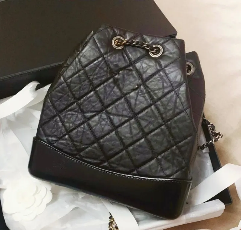 Hot Luxurys Designer Väskor Klassisk modetrend stor kapacitet verklig läderväska axel messenger väska Tassel handväska svart satchel pursesatchel bankett