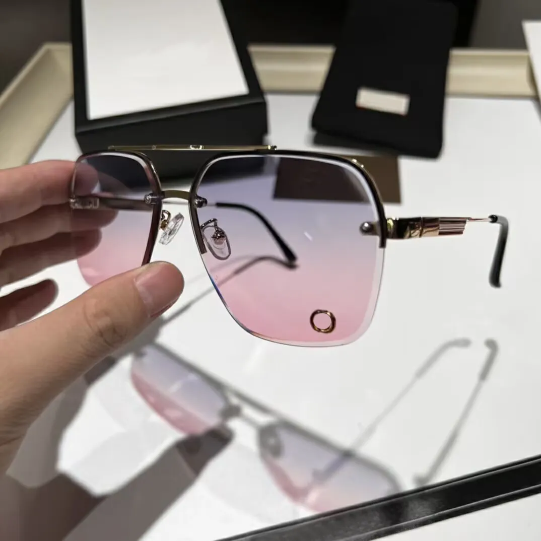 Trendig designer Rimless Solglasögon Låsande bokstäver Ikon Solglasögon Personlighet Män kvinnors glasögon med låda