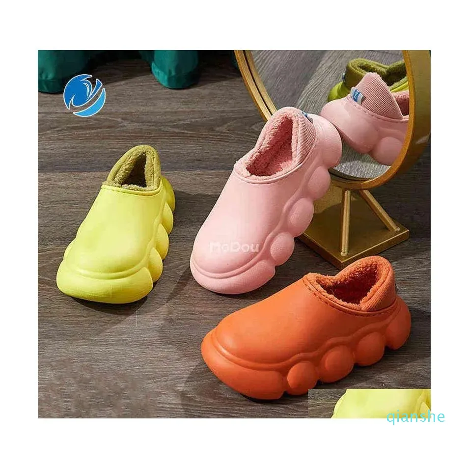 Pantoufles Mo Dou Hiver Chaussures de coton imperméables Couleur unie pour femmes Intérieur Extérieur Boules de mode Semelle chaude Hommes Baskets en peluche Drop Dhwrd