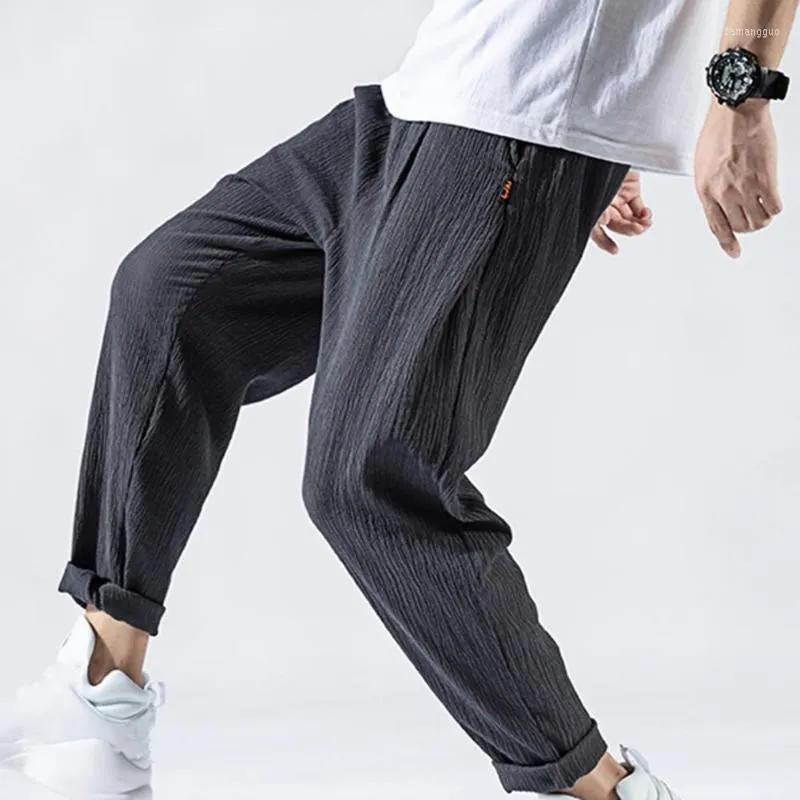Męskie spodnie męskie stylowe hip-hopowe męskie sznurkiem Super cienkie jednokolorowe oddychające wiele kieszeni miękkie spodnie haremowe do uprawiania sportu