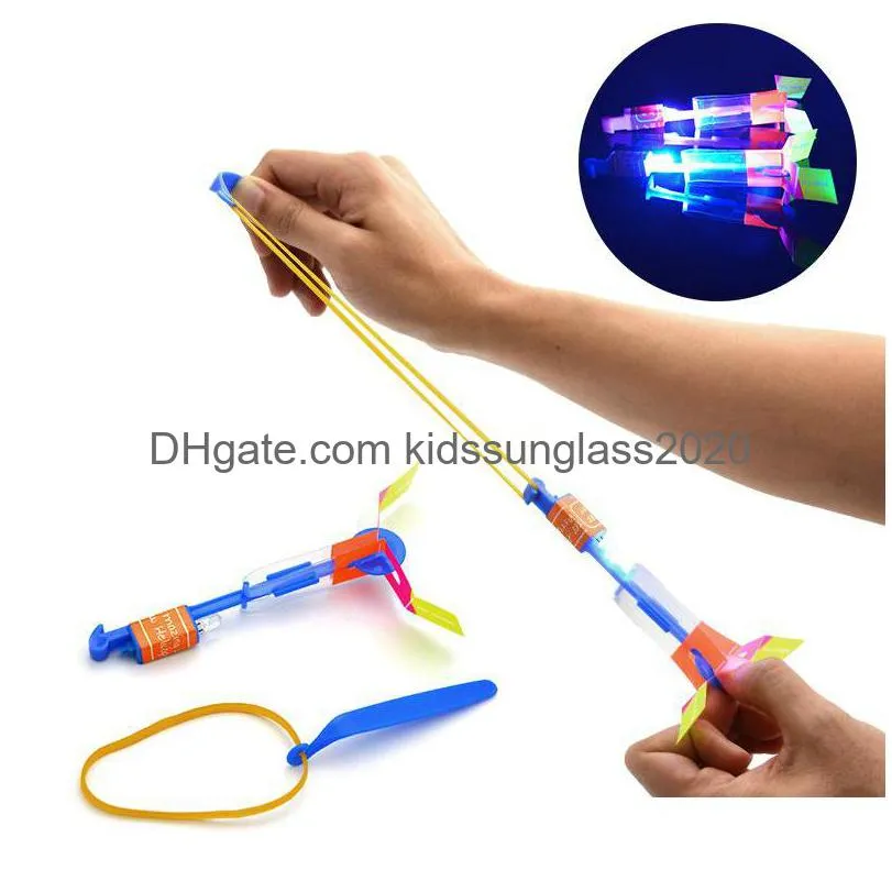 Led Flying Toys Helicopter Rotating Fly Arrow Amazing Elastic Powered