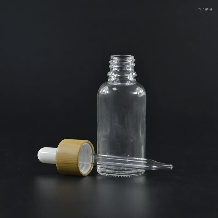 Bottiglie di stoccaggio 100 pezzi 30 ml contagocce in vetro trasparente con coperchi in bambù E bottiglia di olio essenziale da 30 ml