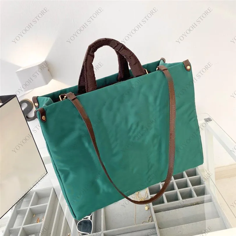Les sacs à provisions de créateurs 22SS sont le sac à main de luxe pour femmes avec un sac d'épaule de lettres classique de haute qualité corps 267c