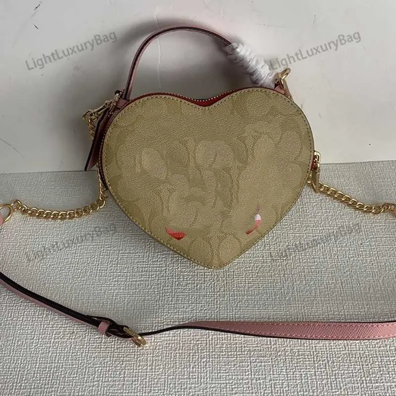 Designer Leather Shoulder Bag Heart Shaped High Quality Tote For Women Fashionable Crossbody Handbag With Shoulder Strap 1106 From Lightluxurybag88 36.27 DHgate.Com