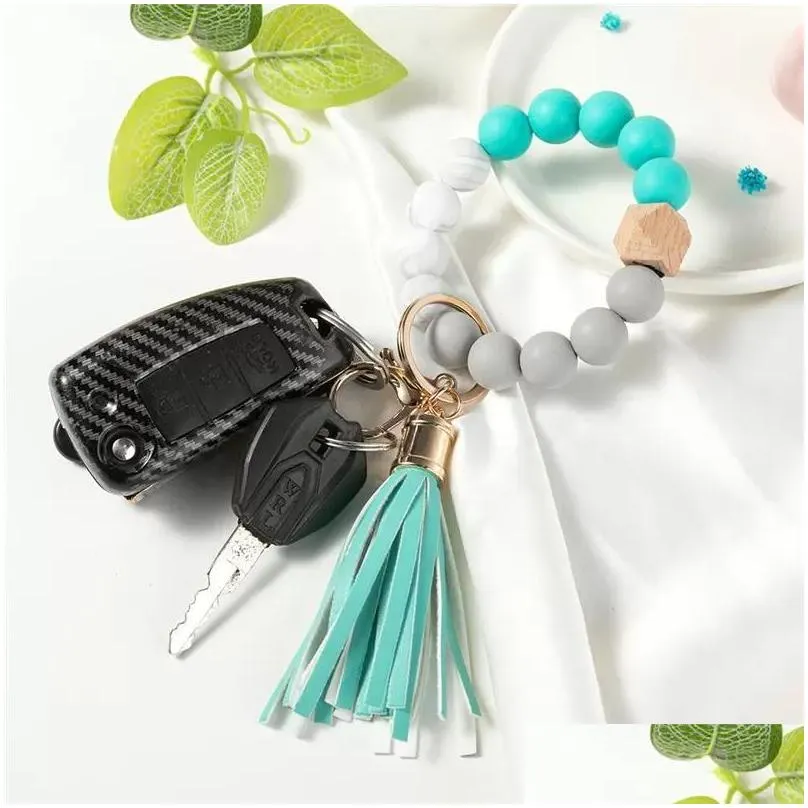 stock wooden tassel bead string bracelets keychain silicone beads women girl key ring wrist strap for car chain wristlet beaded portable gift