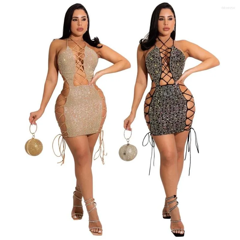 Vestidos casuales Fiesta de las mujeres Moda Sexy Leaky Back Tie Strap Hip Shiny Nightclub Personalidad Drill Commuter Dress