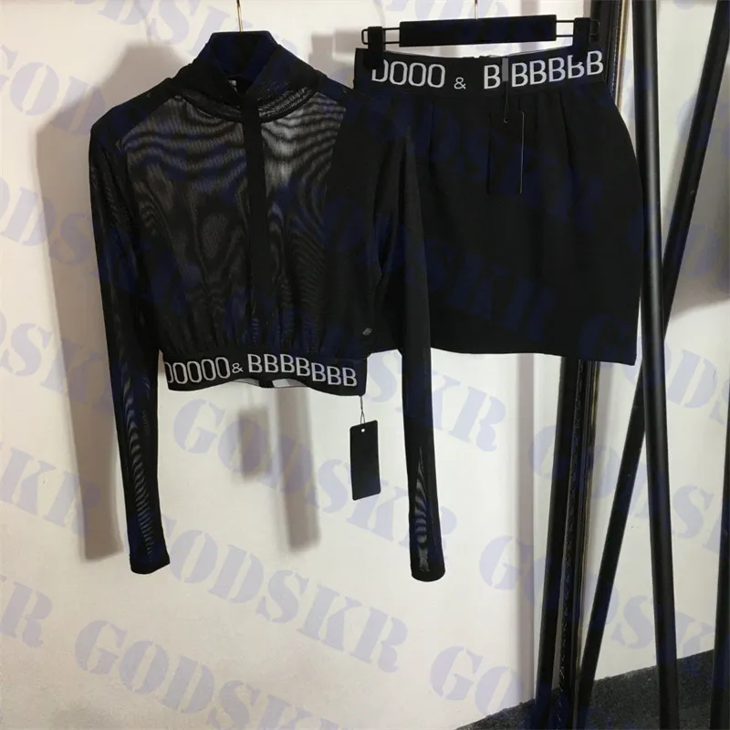 Tops de malha pretos Vestido curto envolto em quadris Camisa fashion transparente feminina Saia sexy de duas peças