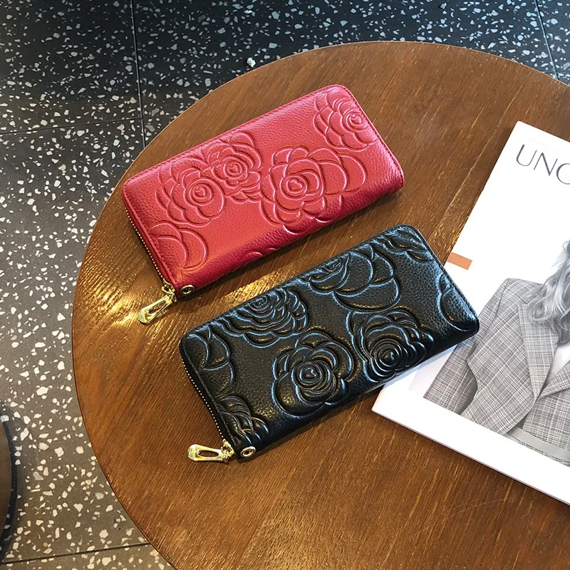 Designer leather purse women's long fashion camellia new head layer cowhide money clip hand mobile phone bag
