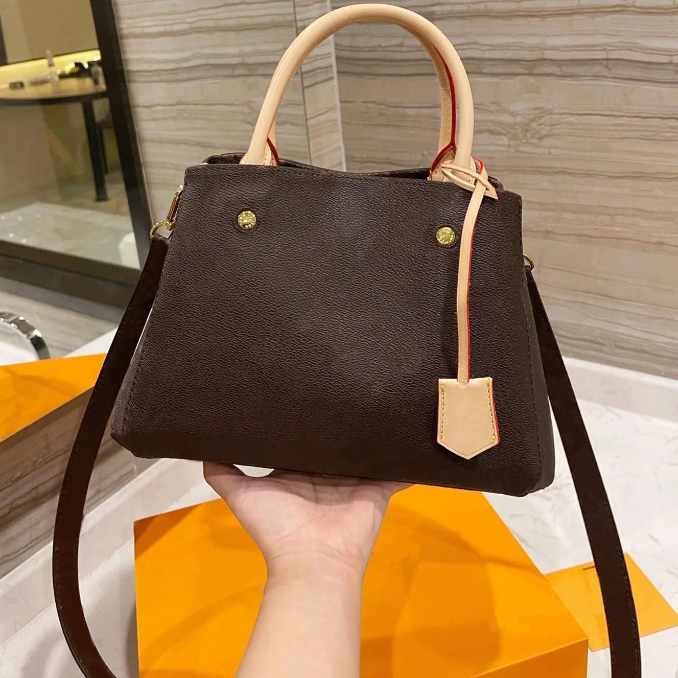 luxurys designers Handbags Purses MONTAIGNEs Bag Women Tote Brand Letter Embossing Leather crossbody Shoulder Bags M41053