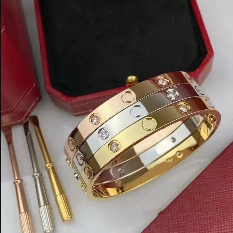Designer skruvarmband mode lyxiga smycken trendiga armband 18k guldpläterad titanstål diamant för kvinnor män nagelarmband designer smycken med dammväska