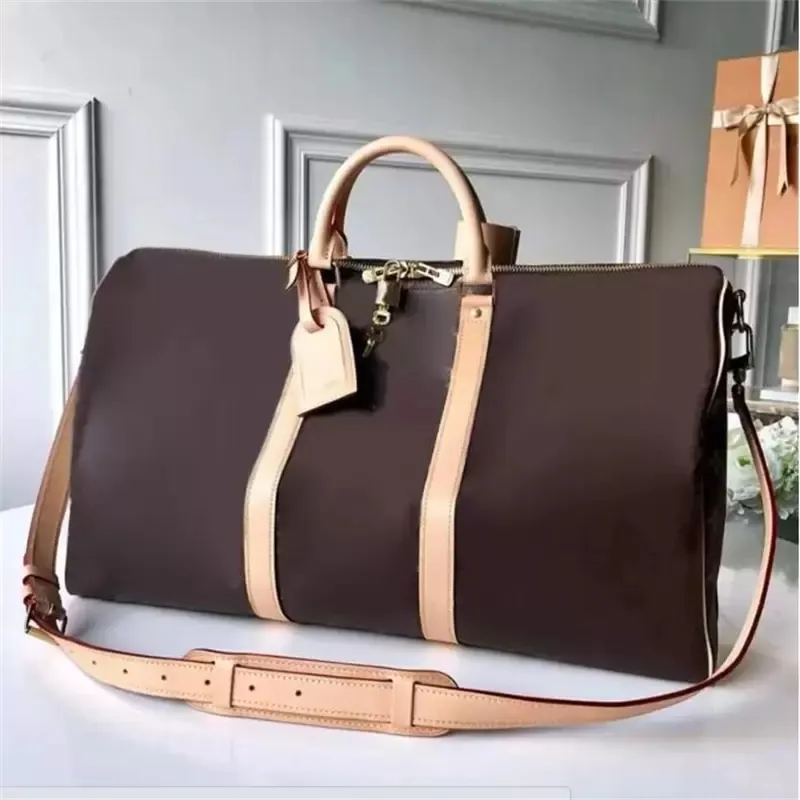 Bolsos de diseñador de lujo bolso de cuero real de gran capacidad bolso de viaje para mujer bolso de cuero portátil de Boston para hombres maleta de borde suave AAAAA tamaños 45cm50cm55cmAAAAAAA