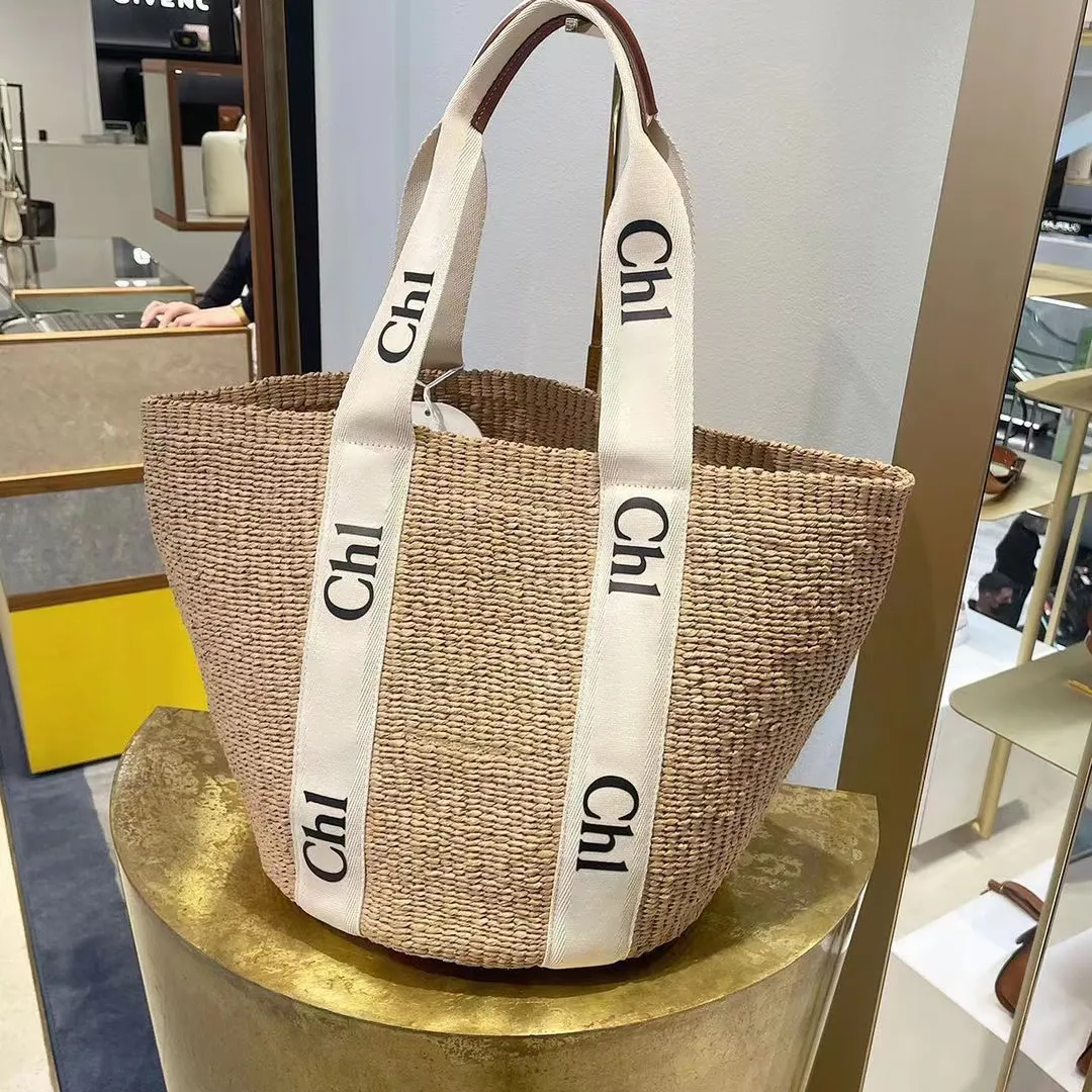 Kvinna WOODY Halmhink tote Designers Väskor Dam Herr Shoulder Mode Shopping sommar Strandsemester stor Crossbody helg resor handväska clutch korg Väska