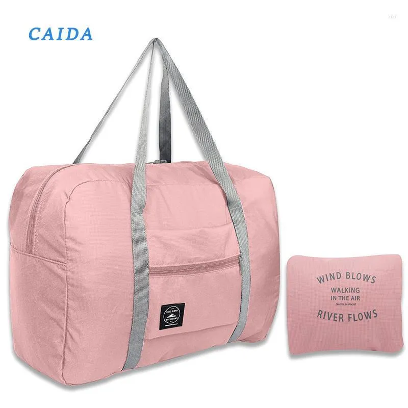 Duffel Bags Caida 2022ナイロン折りたたみ旅行ユニセックス大容量バッグ荷物女性の防水ハンドバッグ男性