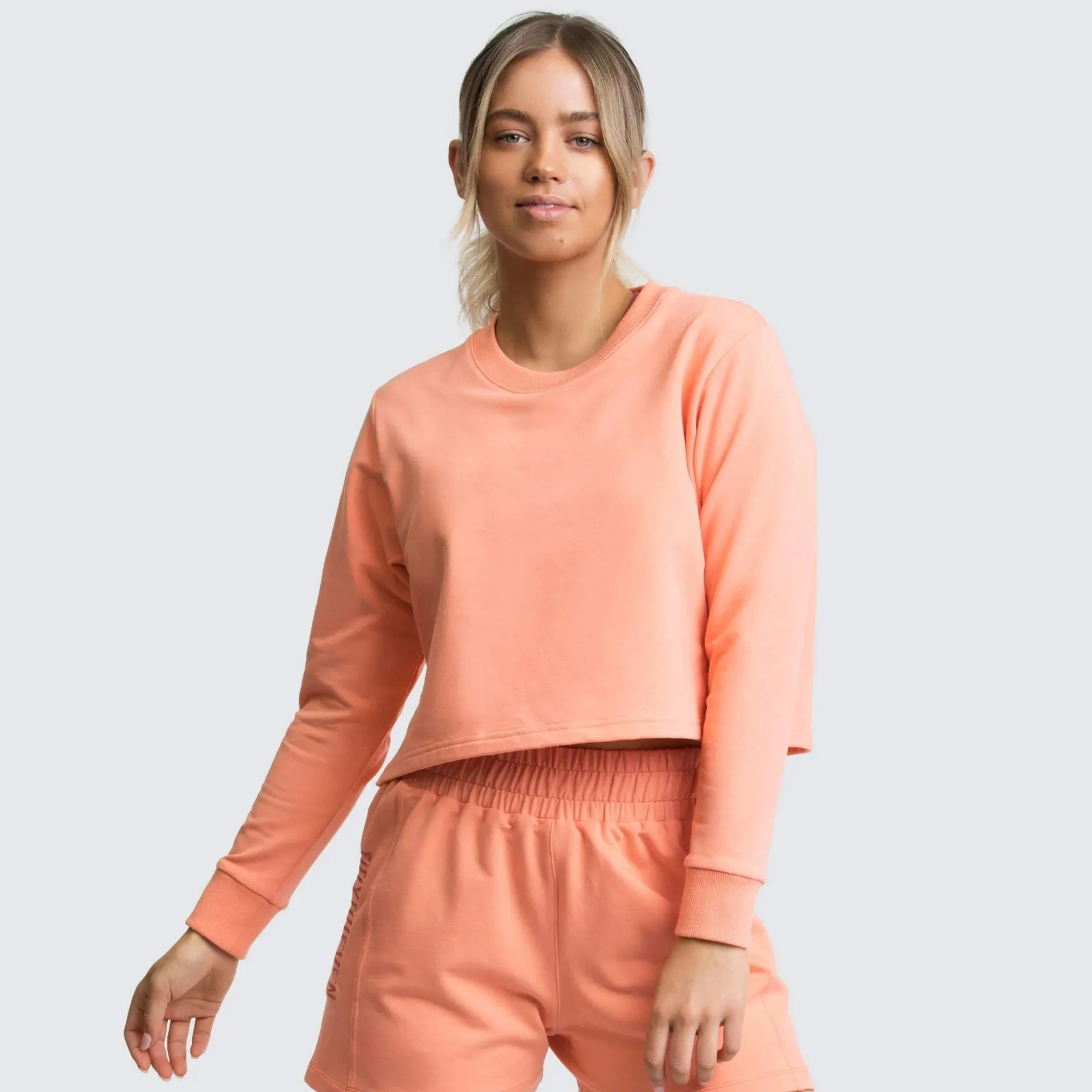 Camiseta para mujer Ropa de gimnasia Arruga de yoga Top deportivo A prueba de golpes Correr Entrenamiento físico de alta resistencia Ajuste ajustado Camiseta de manga larga multicolor de color sólido