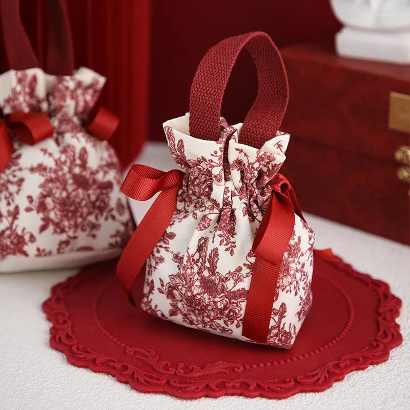Cadeau cadeau 20pcs / lot sacs en tissu imprimés créatifs de mariage fournitures de festival de bonbons paquets portables petit emballage