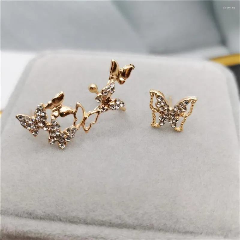 Dos boucles d'oreilles mode creux pleine perceuse femmes papillon asymétrique oreille os Clip bijoux