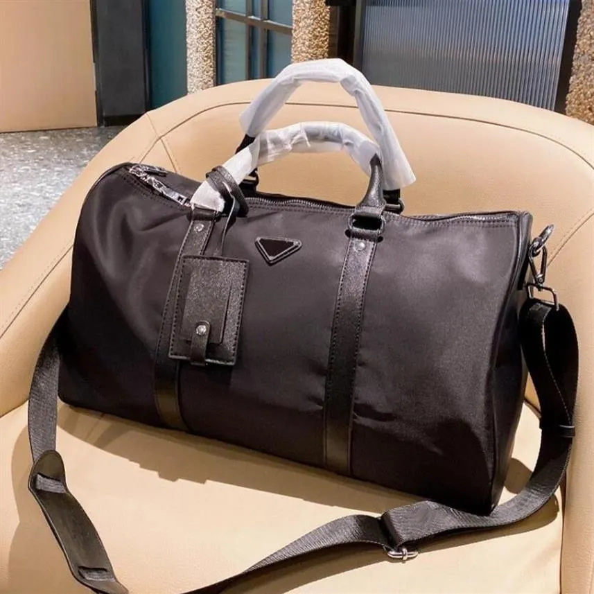 Elogio y explosión Hombres de calidad superior Moda Bolsa de lona Bolsas de viaje de nylon negro Para hombre Equipaje con asa Caballero Totes de negocios con 155e