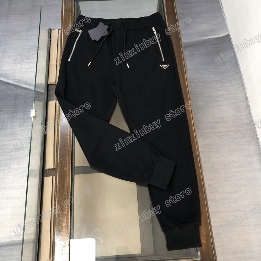 22ss الرجال النساء مصمم السراويل المعدنية مثلث التسمية سستة جيب النايلون ميلان بانت الرجال حزام السراويل السوداء xinxinbuy S-XL