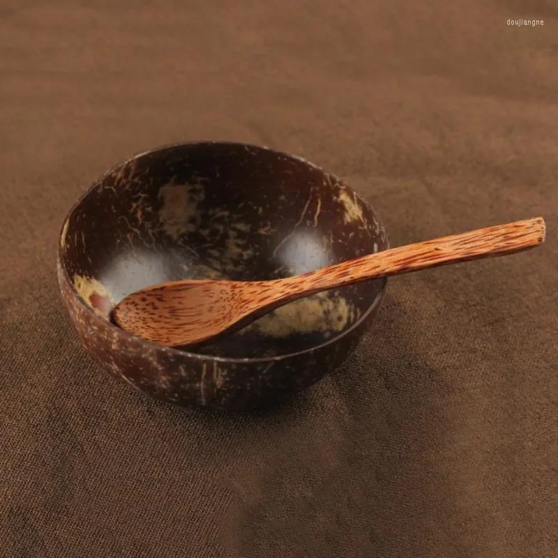 Skålar säljer naturlig kokosnötskål handgjorda skal bordsartar trä sked dessert frukt sallad blandar ris ramen