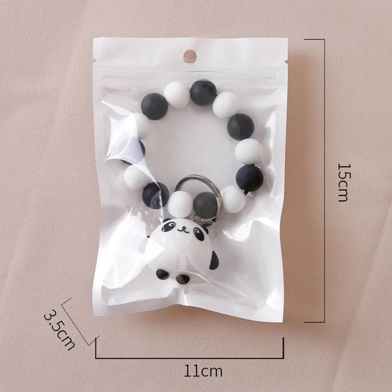 Portachiavi Con Ciondolo A Forma Di Panda Di Cartone Animato Braccialetti  Con Perline In Silicone Accessori Di Moda Portachiavi Con Bambola Carina Da  3,06 €