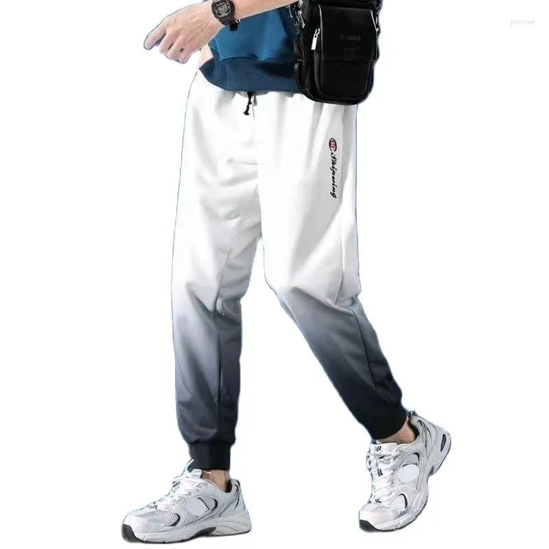 Calça masculina pacote de tubo reto guarda de pés homens soltos primavera e outono basquete na versão coreana do esporte casual de tendência