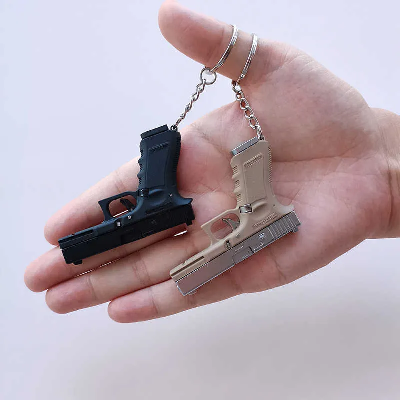 Gun Toys Portable Gun Model Keychain Glock G17 Pistol Shape Keychain Mini Metal PUBG M29F Desert  Shell Ejection Free Assembly T221105