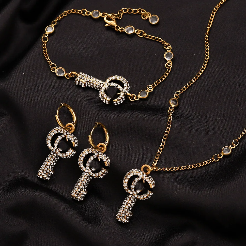 Mujeres Dise￱ador Bangles Link Cadena Letra de la marca Pulsera Collar de acero inoxidable Pendimiento de collar de oro de 18 k
