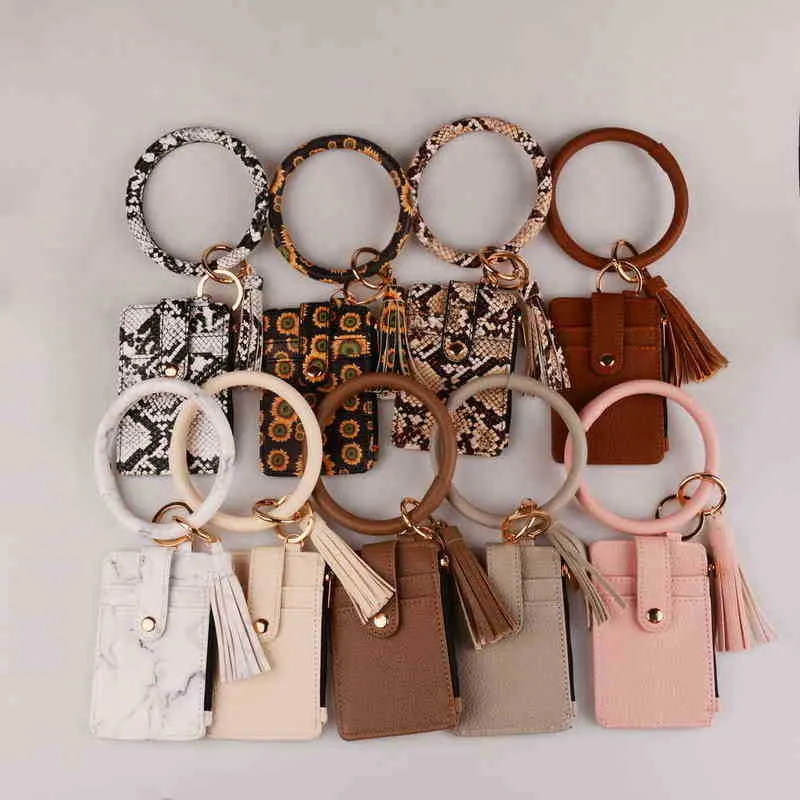 Keychains 2022 Ny heta säljnyckelknappsäck för kvinnor män leopard o plånbok pu läder tofs card påsar orm armband blixtnedslagssympling t220909