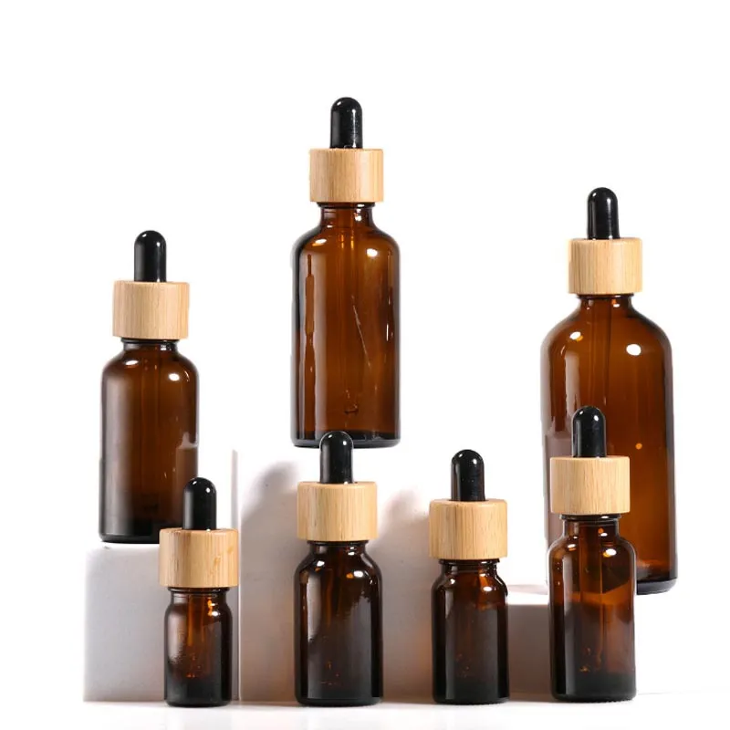 Bottiglie di profumo di olio essenziale di vetro Flacone contagocce ambrato da 5-100 ml con tappo in bambù