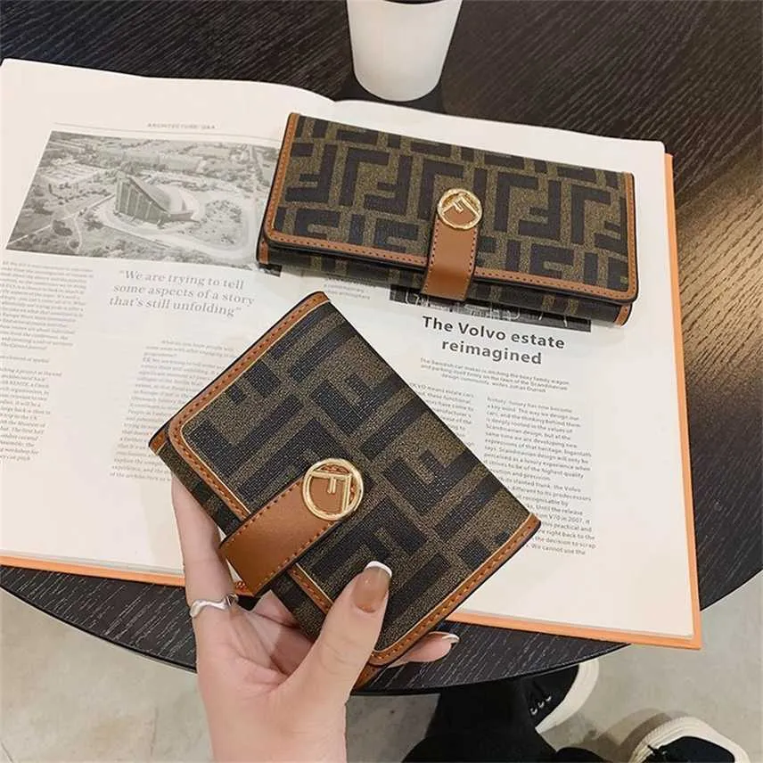 Clearance summer new contrast Pu buckle soft face short Wallet