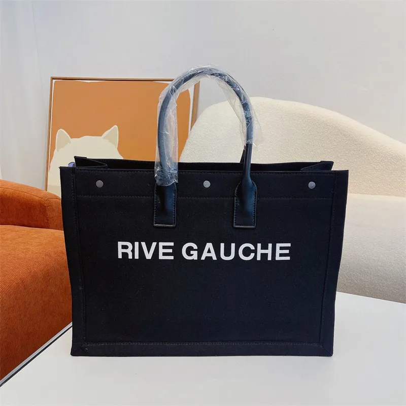 المرأة حمل حقيبة مصمم Rive Gauche حقيبة يد الموضة حقيبة تسوق فاخرة العلامة التجارية قماش حقائب اليد حقائب كبيرة للشاطئ عادية 4 ألوان