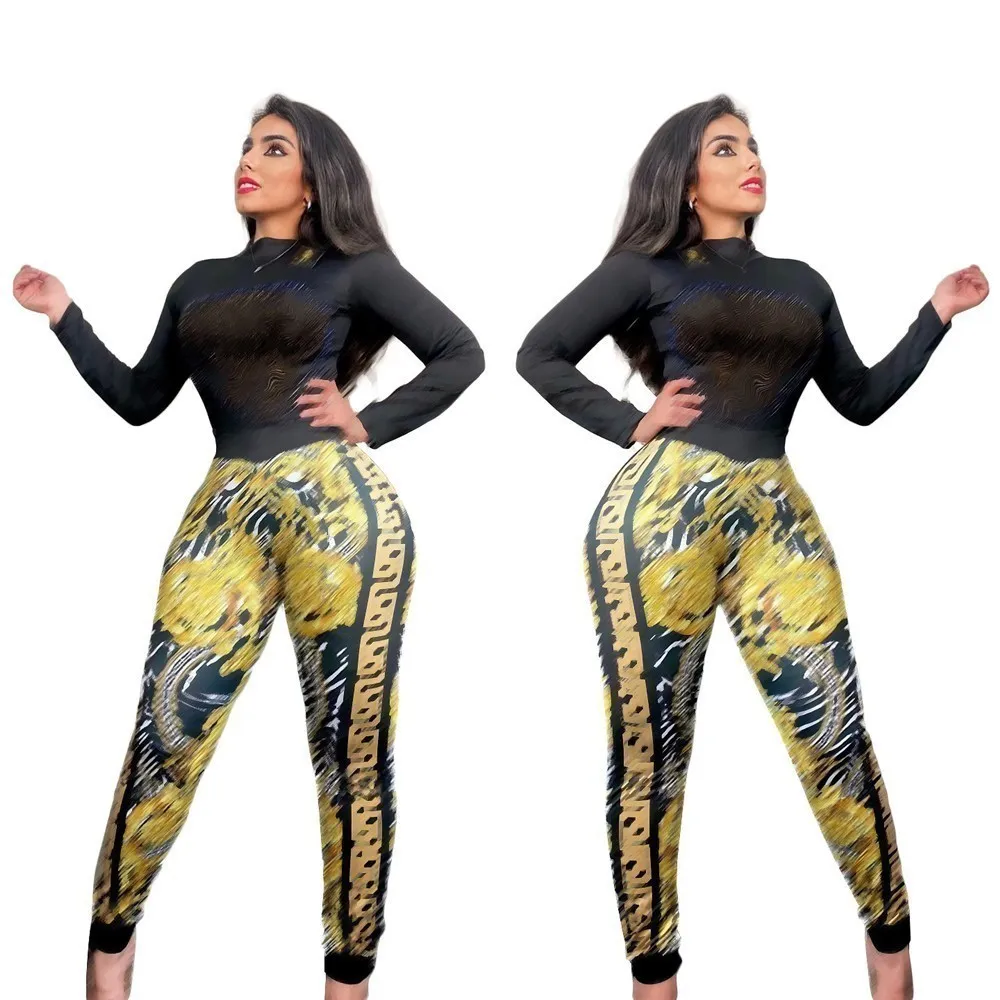 Diseñador de la marca Mujeres Chándales Traje de jogging Cuello alto Conjunto de dos piezas Imprimir Pantalones de jersey negro Traje de dama Trajes de manga larga Ropa de diamantes de imitación 8992-7