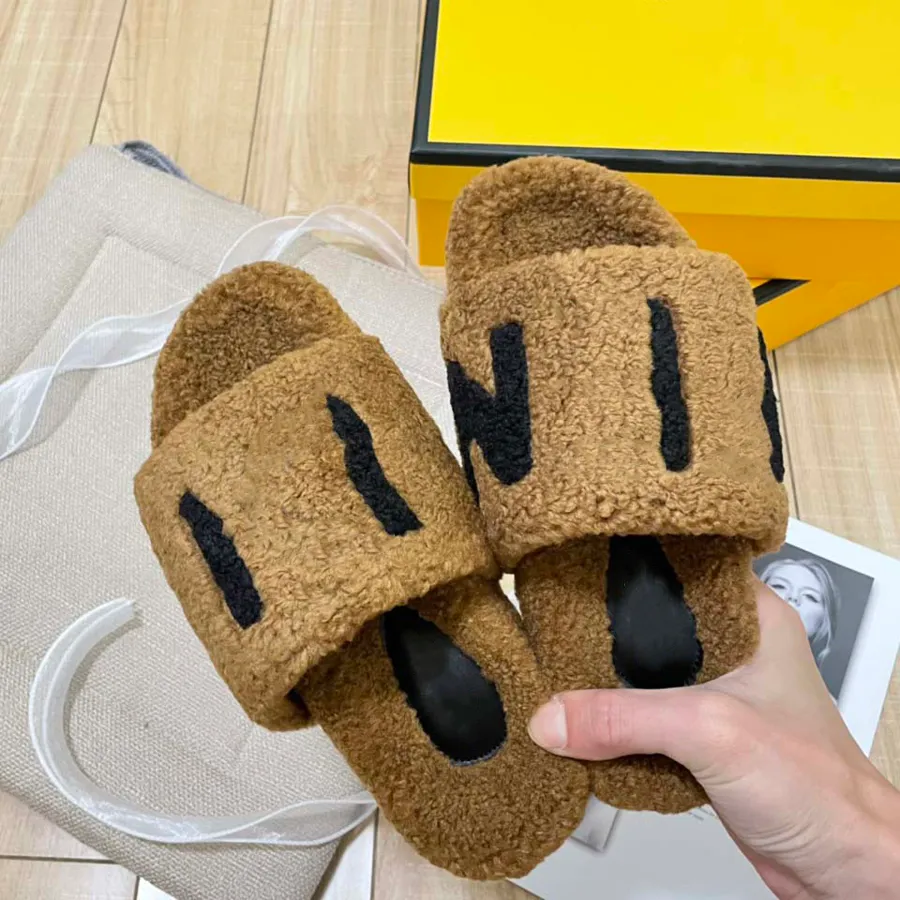 10a kvinnors plysch fluffiga päls tofflor märkesdesigner skor varma inomhus flip-flops mode01