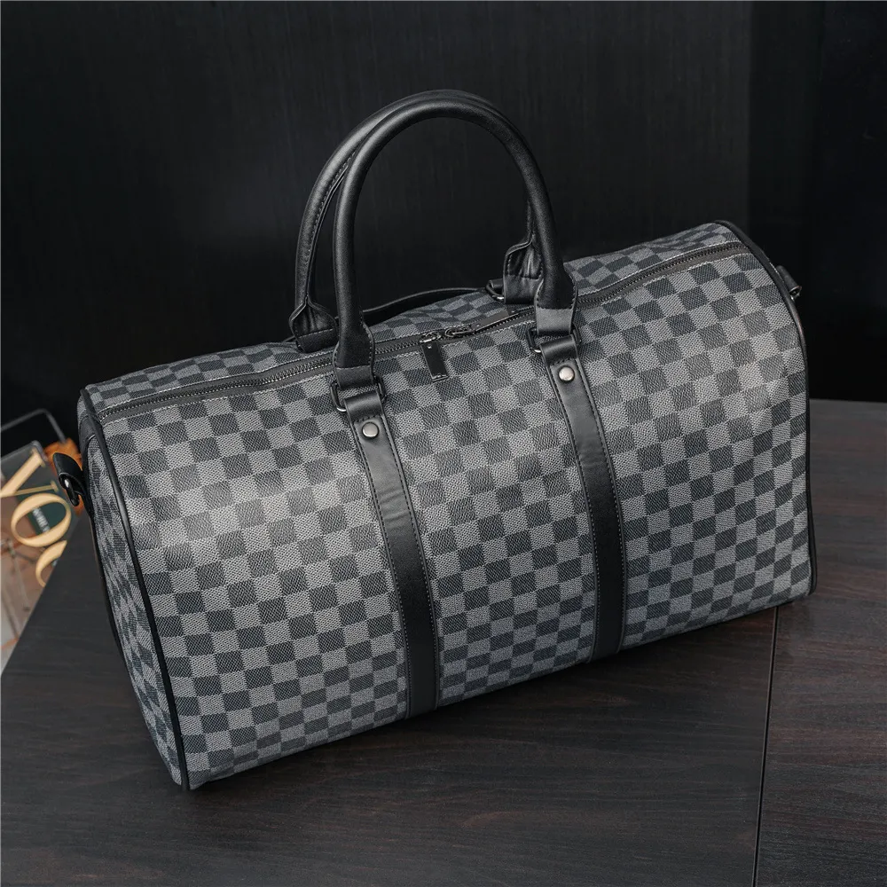 2023 Duffle Women Hand Lage Travel Men Pu Bolsos de cuero Bolsos grandes Totes 55 cm Monedero Bolso cruzado