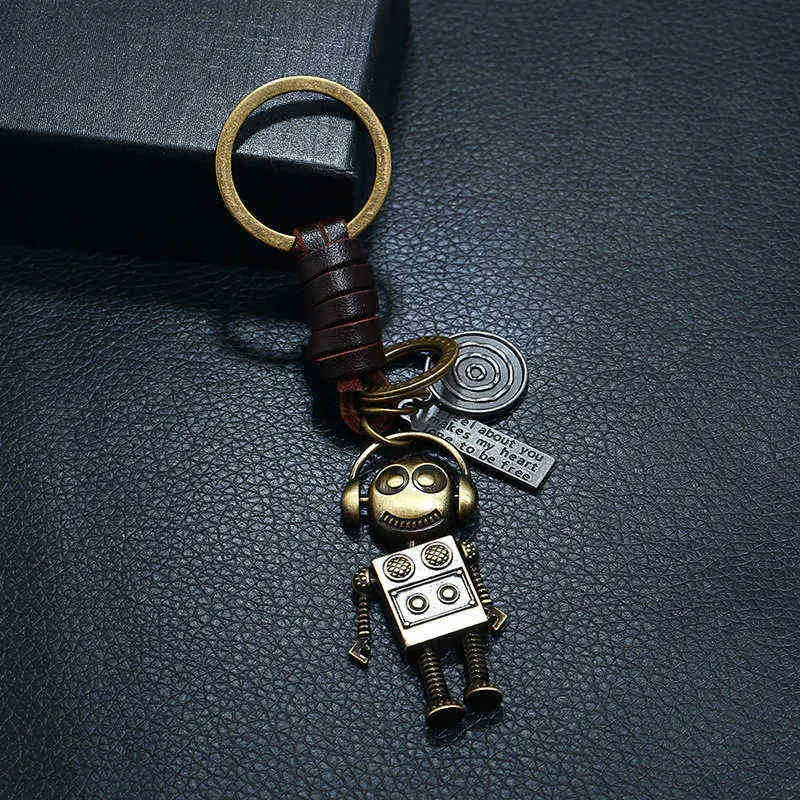 Keychains 2021 Nyaste modepunk handvävd läder nyckelring påse smycken legering robot retro cowhide nyckelring kreativ liten gåva charm T220909