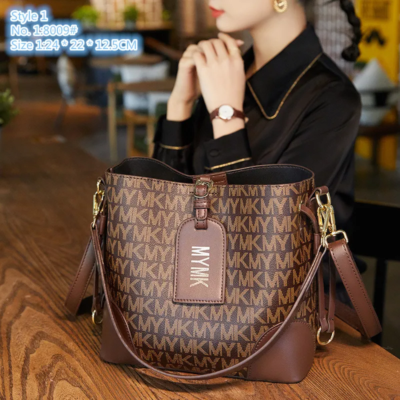 Wholesale factory ladies shoulder bags 3 colors everyday Joker printed backpack elegant letter bucket bag three-layer barrier contrast leather handbag