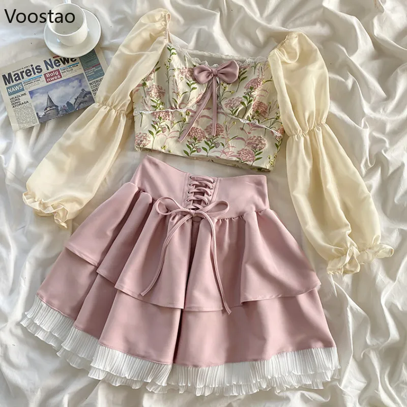 Vestido de duas peças vestidos casuais saia lolita conjunto de mulheres elegantes France France Bow Square Gollar Buff Blouse Crots Tops