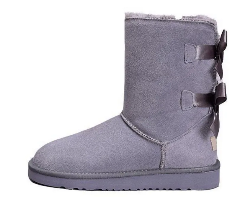 2022 designers australiska snöstövlar kvinnor klassiska med päls skor kvinnor vinter båge knä höga sneakers boot s2