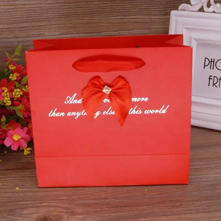 Confezione regalo 10 pezzi Sacchetto di carta portatile di alta qualità Cravatta da imballaggio creativa con fiori di caramelle