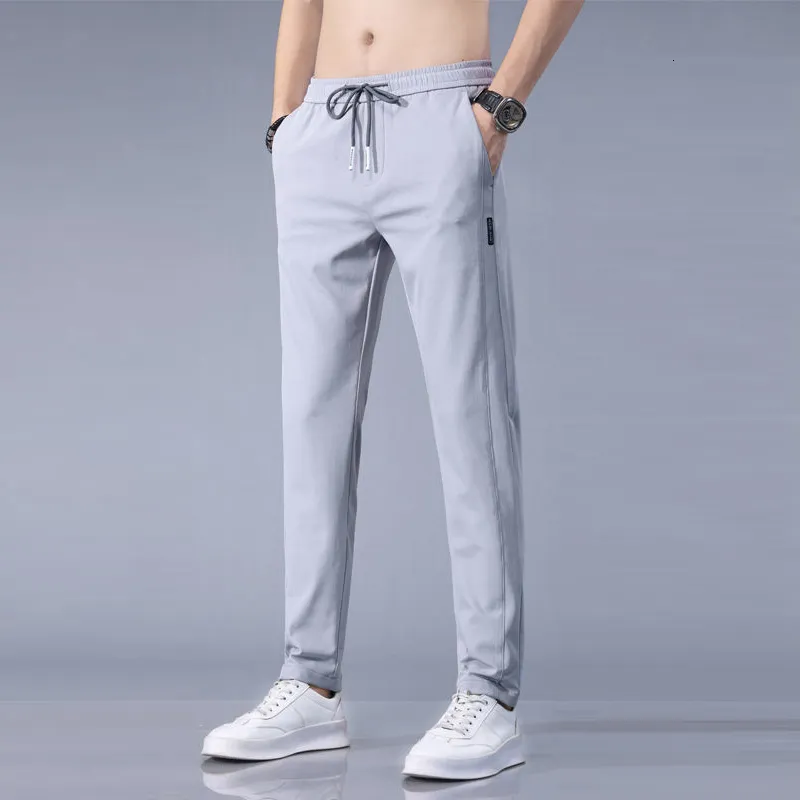 Chándales de los hombres Verano Casual Juvenil Pantalones de seda de hielo Deportes Delgados Leggings de gran tamaño Versión coreana recta 221122