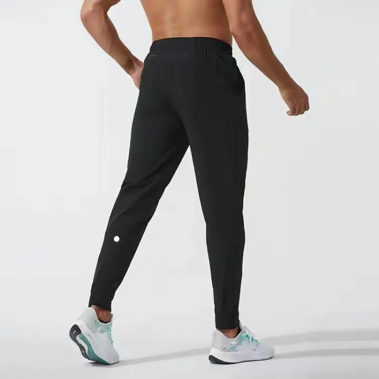 LL Jogger Långbyxor Herr Sport Yoga Outfit Snabbtork Dragsko Gymfickor Träningsbyxor Byxor Herr Casual Elastisk midja fitness