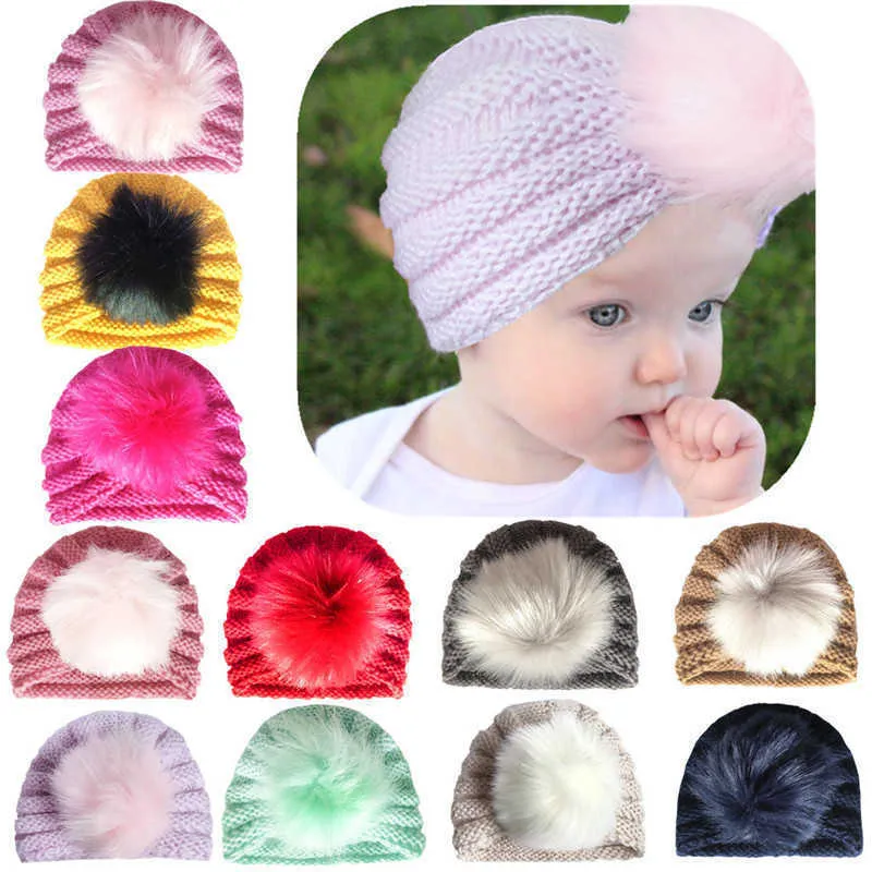 CAPS HATS Ny produkt Autumn Winter Baby Children's Warm Woolen Earmuffs Head Fur Ball Lämplig för 0-3 år L221028