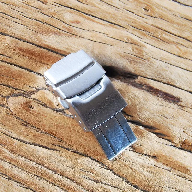 Deployment clasp with safety hotsell