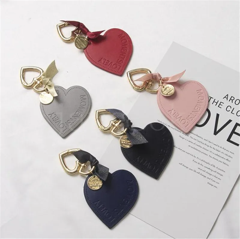 6 Cores de couro doce PU Heart Bowknot Cartoon Keychain for Women Triket Key Chains Ring Bag Saco de charme pendente de brinquedos infantis de961